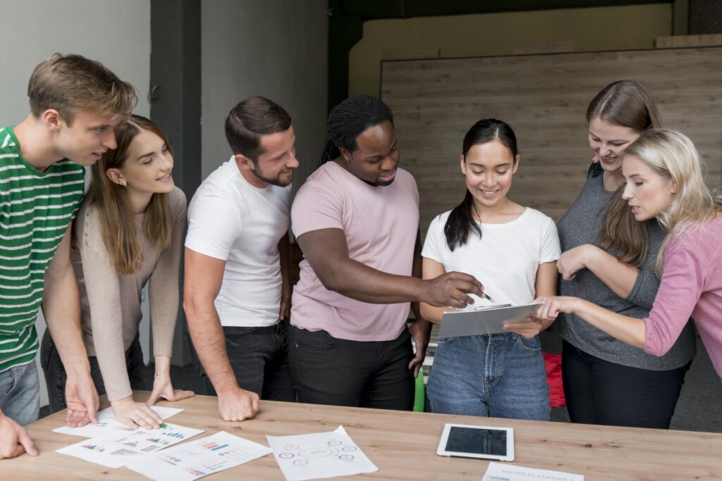 Group of diverse individuals collaborating and brainstorming ideas.